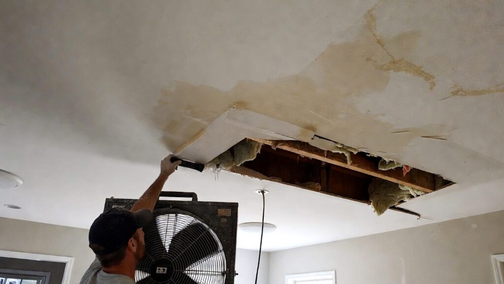Residential ceiling water damage repair in progress